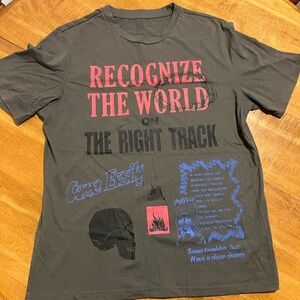 Graphic Tee with Bold Text and Skull Design